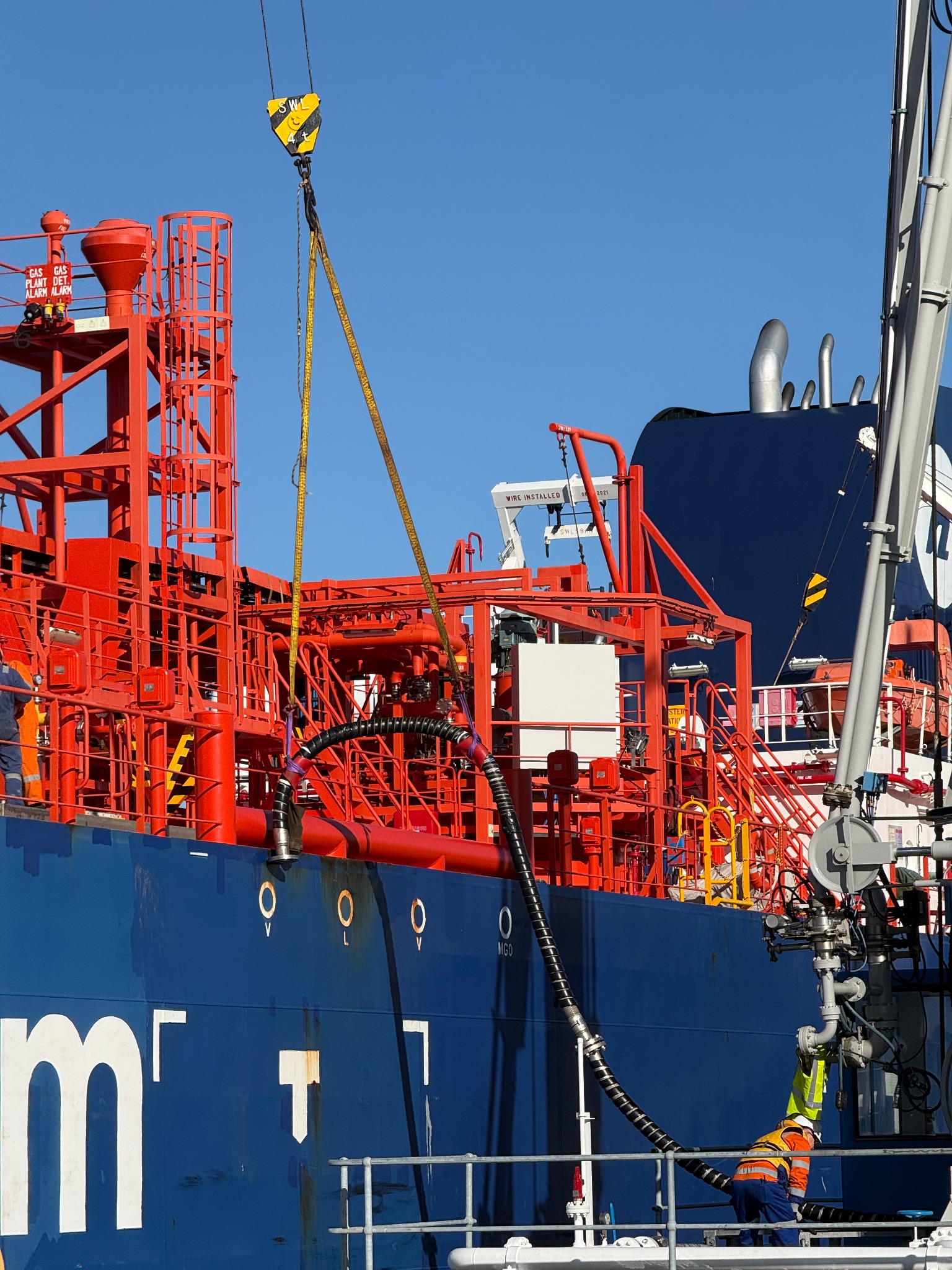 Industrial marine site work with lifting equipment and transfer infrastructure